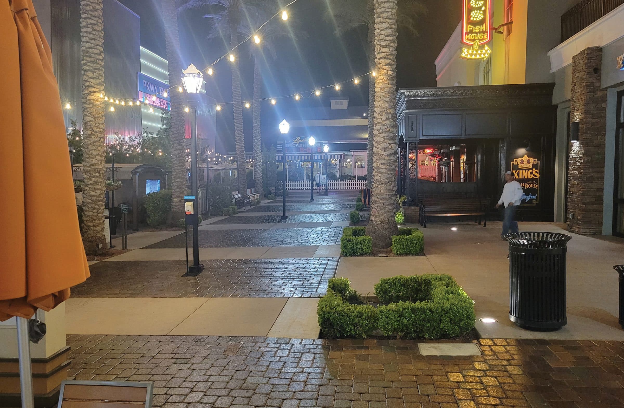 Restored commercial paver walkway at dusk